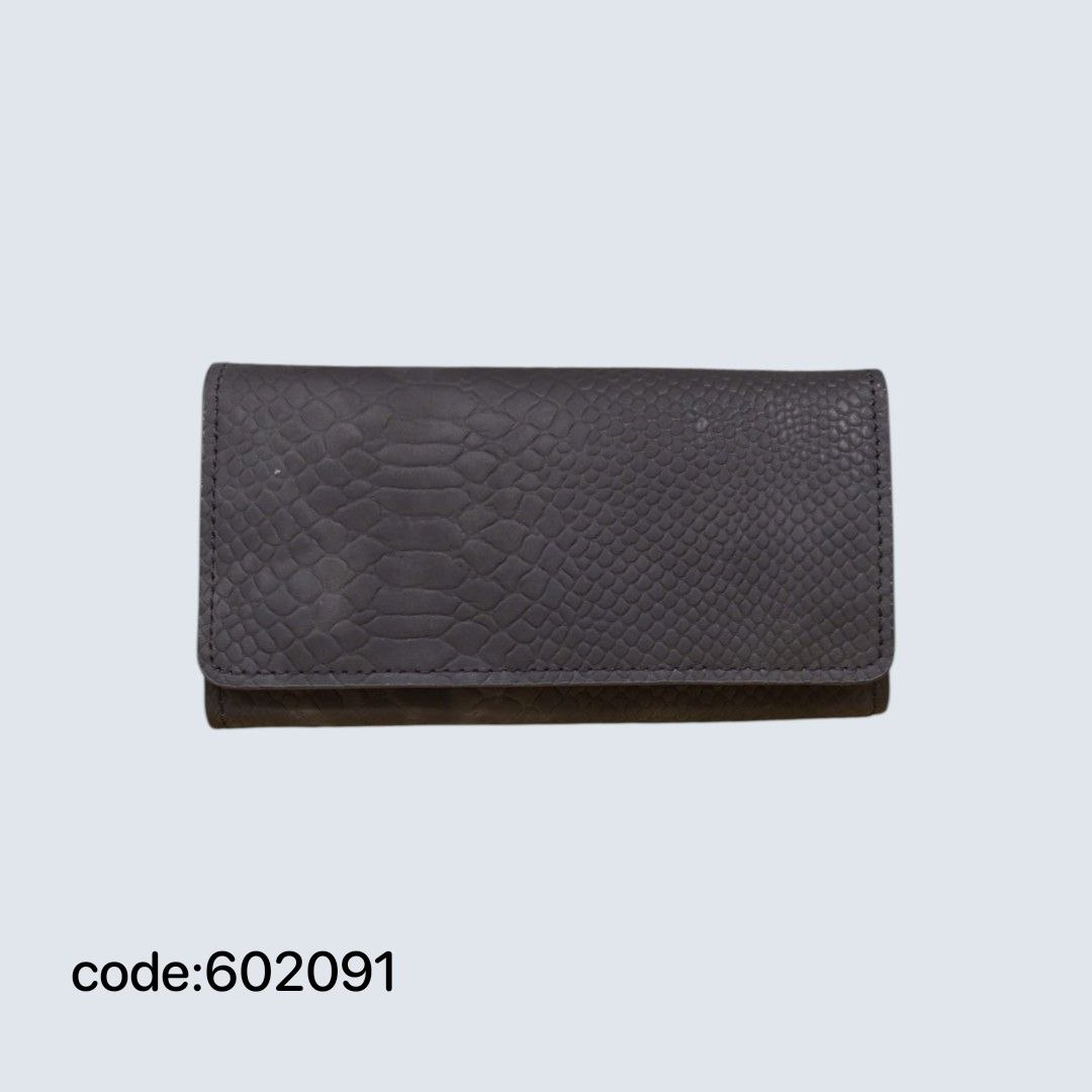 کیف پول دستی چرم طبیعی مدل MI.Melina D133 کد 602091 کیف پول دستی چرم طبیعی مدل MI.Melina D133 کد 602091
